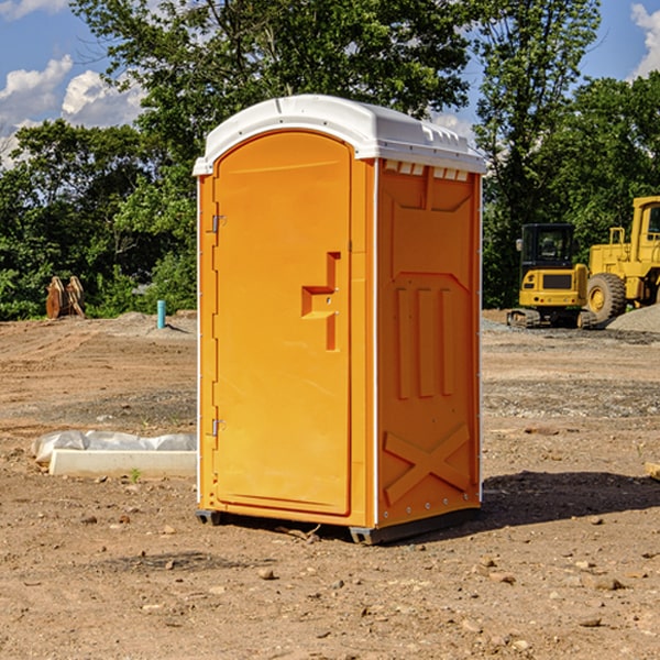 how often are the porta potties cleaned and serviced during a rental period in Harrison